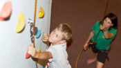 A student at the climbing wall