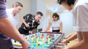 Students playing table football in Constance